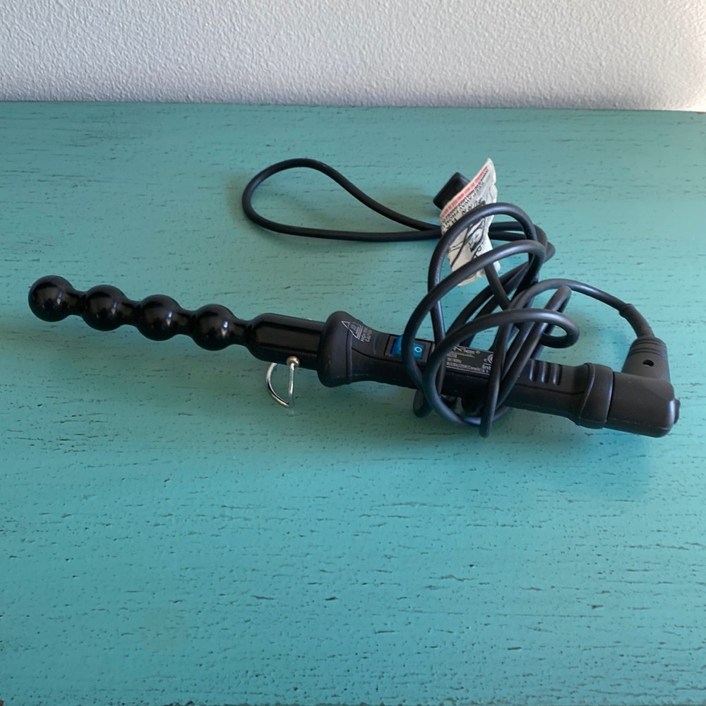 NUME Bubble Curling Iron has 4.9 *